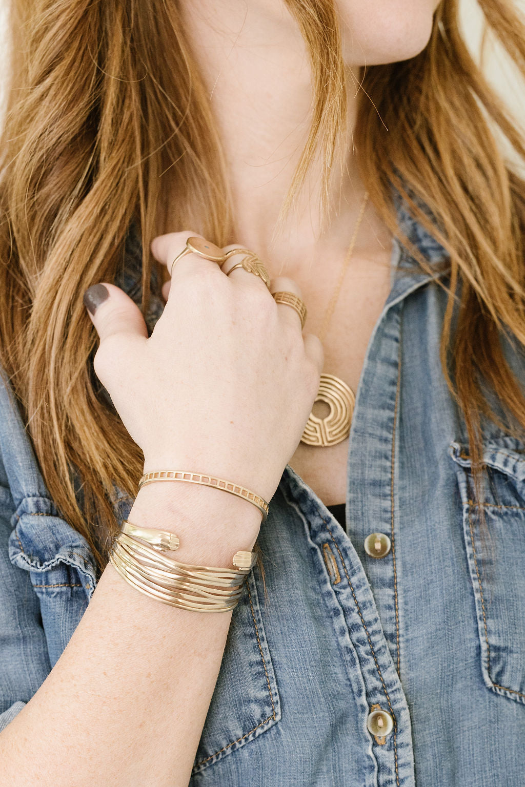 A Woman Wears Bronze MIMOSA Handcrafted Everyday Jewelry
