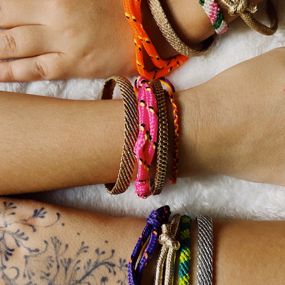 Friends Wear the MIMOSA Handcrafted Friendship Bracelet Jewelry Collection