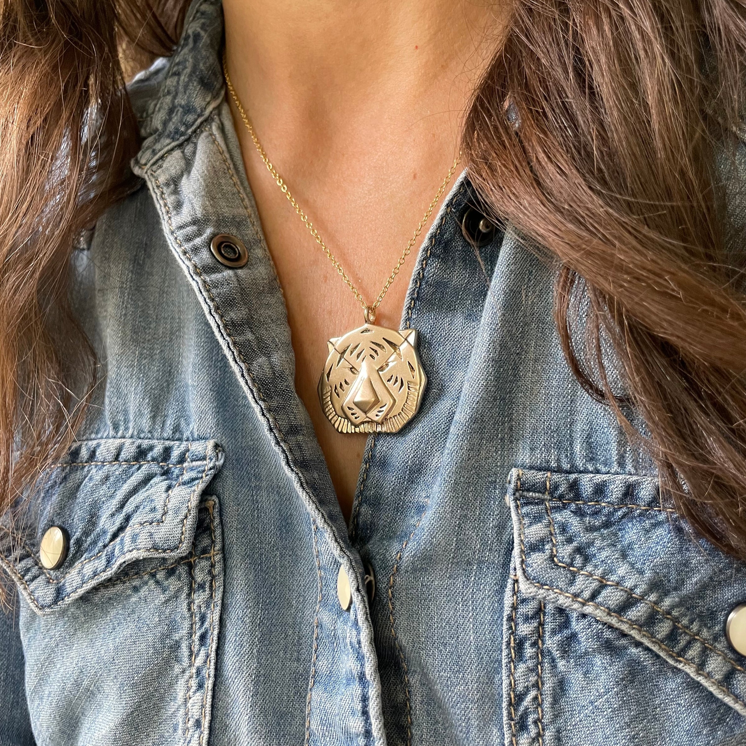 Woman Wears MIMOSA Handcrafted Large Tiger Pendant in Bronze