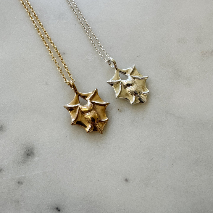 Bat necklace in bronze and sterling silver