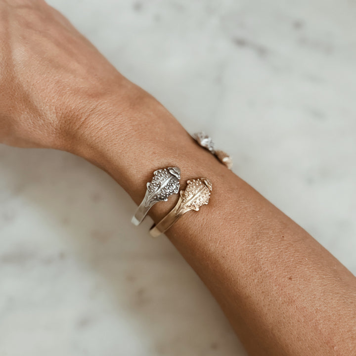 Woman Wears the MIMOSA Handcrafted Horned Toad Bracelet in Bronze and Sterling Silver