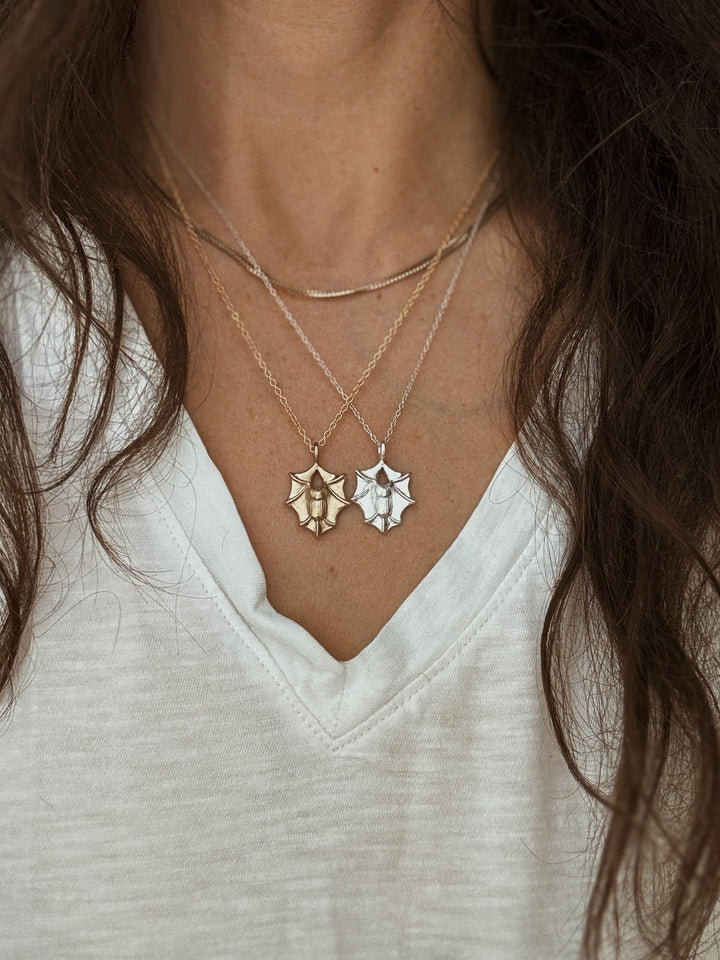 Bat necklace in bronze and sterling sterling silver