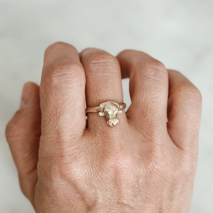 Person Wears the MIMOSA Handcrafted Longhorn Ring in Bronze
