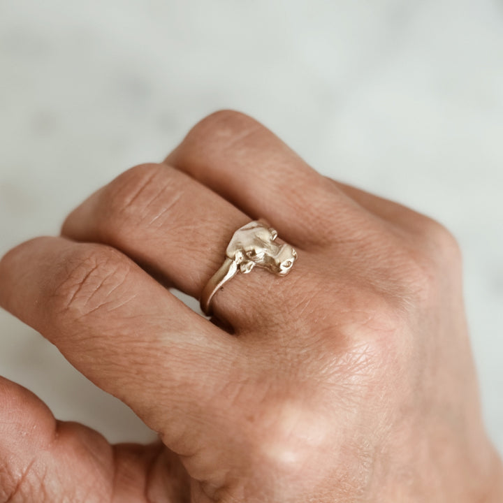 Person Wears the MIMOSA Handcrafted Longhorn Ring in Bronze