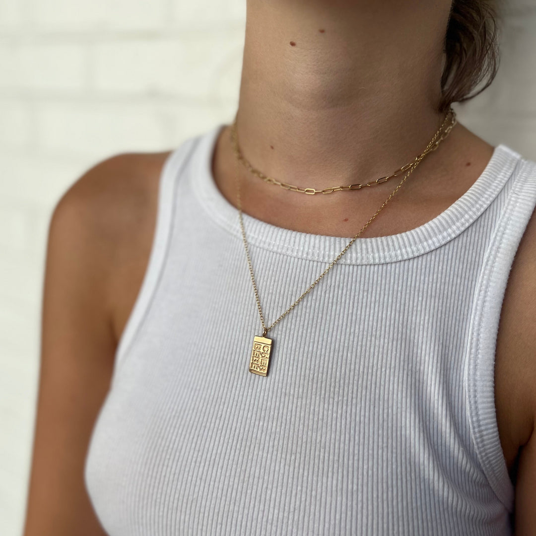 Woman Wearing Handcrafted Cajun Cher Bebe Pendant Necklace