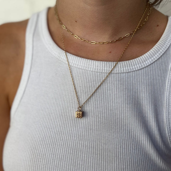 Woman Wearing Handcrafted Dice Pendant Necklace