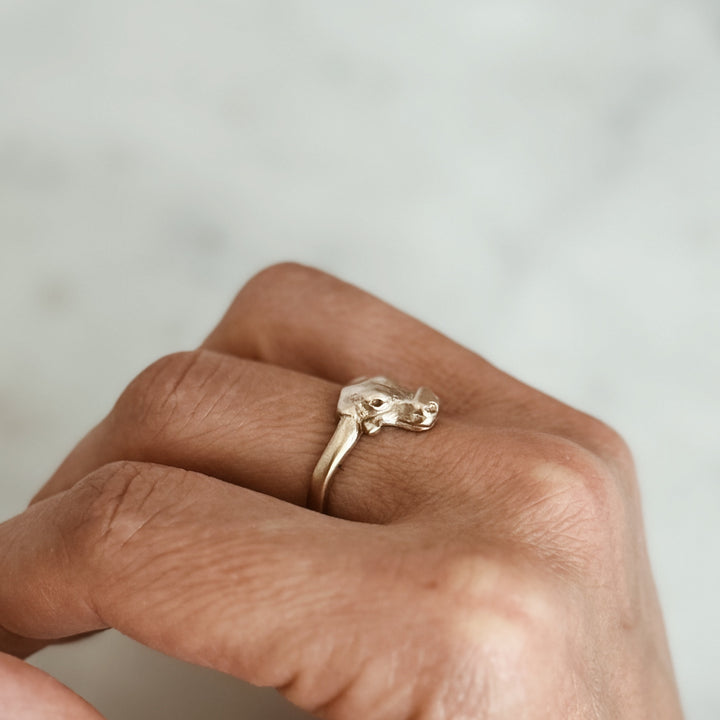 Person Wears the MIMOSA Handcrafted Longhorn Ring in Bronze