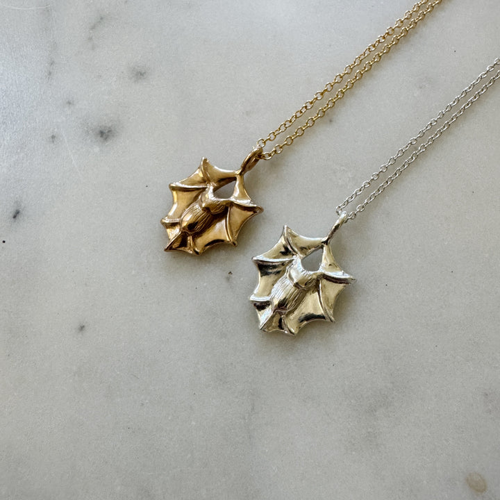 Bat necklace in bronze and sterling silver