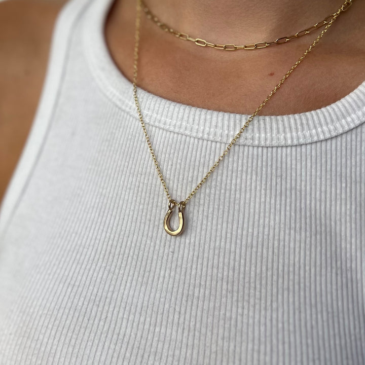 Woman Wearing Handcrafted Lucky Horseshoe Pendant Necklace