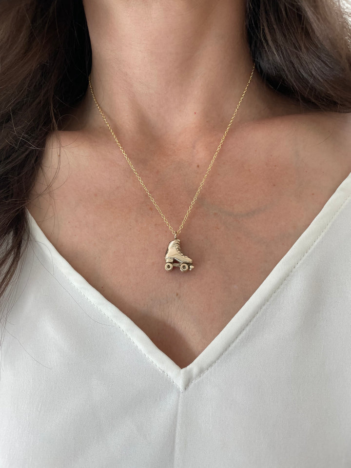 Woman Wearing Handcrafted Roller Skate Pendant Necklace