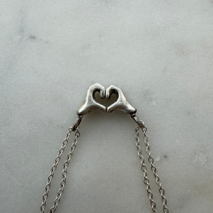 MIMOSA Handcrafted Heart Hand Necklace in Sterling Silver