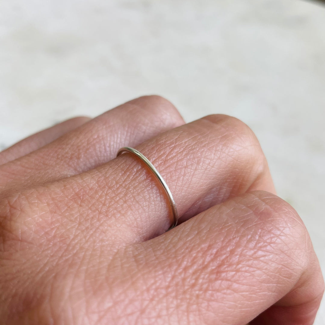 Woman Wearing Sterling Silver Tiny Ring