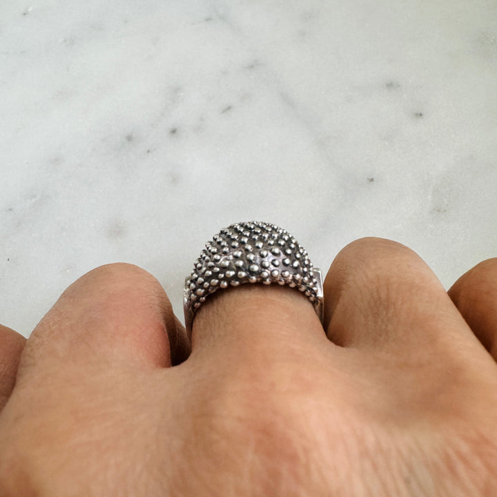 Woman Wears the MIMOSA Handcrafted Mock Strawberry Ring in Sterling Silver