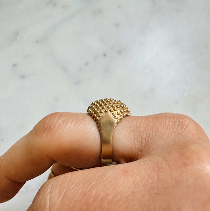 Woman Wears the MIMOSA Handcrafted Mock Strawberry Ring in Bronze