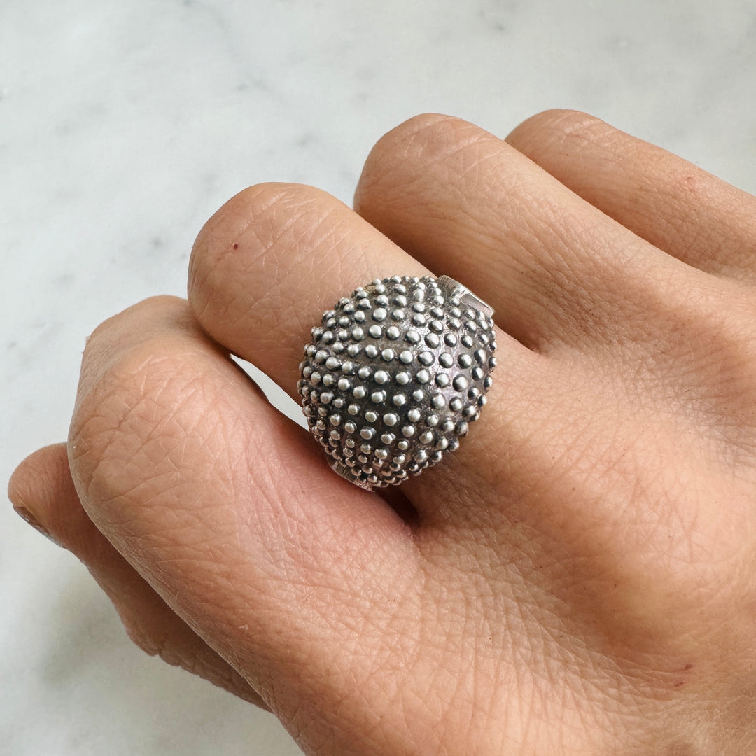 Woman Wears the MIMOSA Handcrafted Mock Strawberry Ring in Sterling Silver