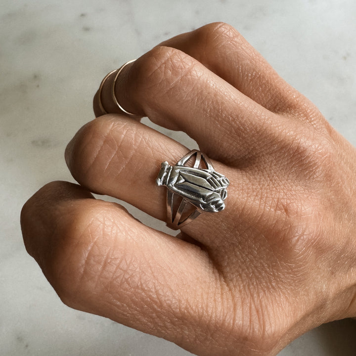 Person wears the MIMOSA Handcrafted Cicada Ring in Sterling Silver
