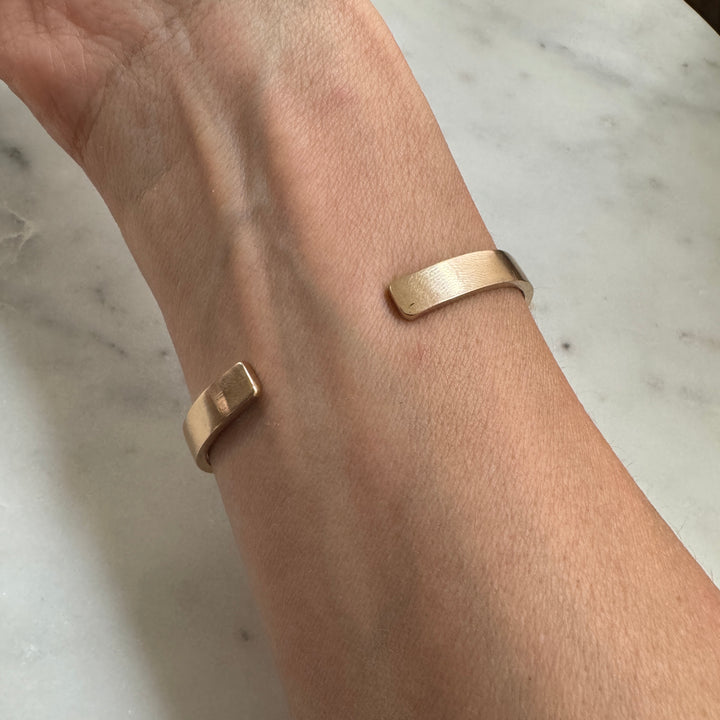 Woman Wears the MIMOSA Handcrafted Pet Collar Bracelet