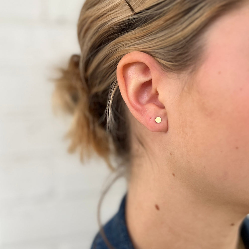 Woman Wears the MIMOSA Handcrafted Gold-Filled Dots Studs