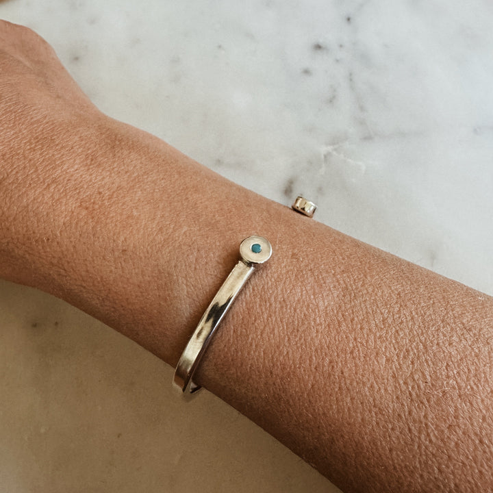 Woman Wears the MIMOSA Handcrafted Duo Turquoise Bracelet in Sterling Silver
