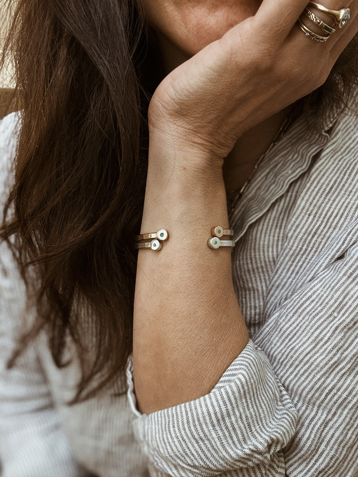 Woman Wears the MIMOSA Handcrafted Duo Turquoise Bracelet in Bronze