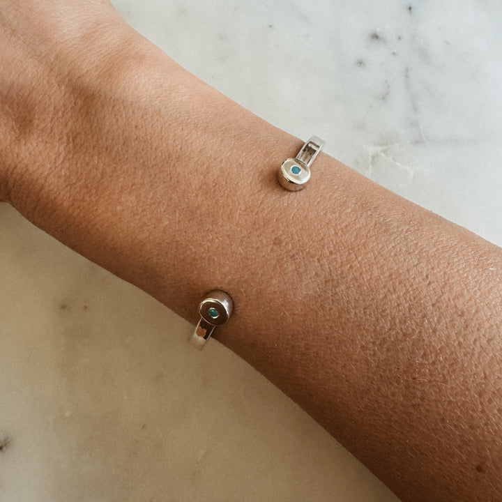 Woman Wears the MIMOSA Handcrafted Duo Turquoise Bracelet in Sterling Silver