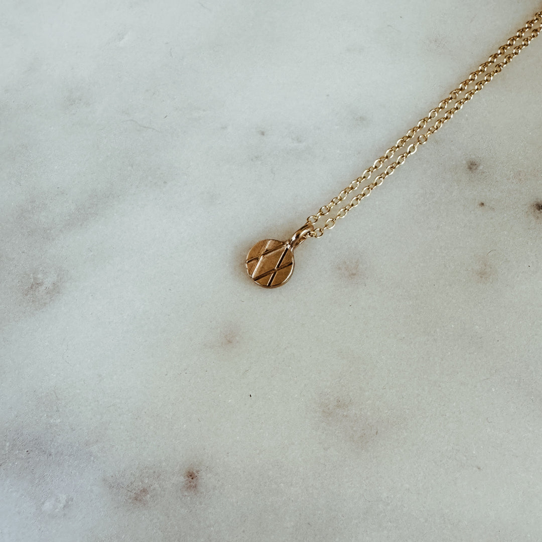 MIMOSA Handcrafted Joy and Sorrow Pendant in Bronze