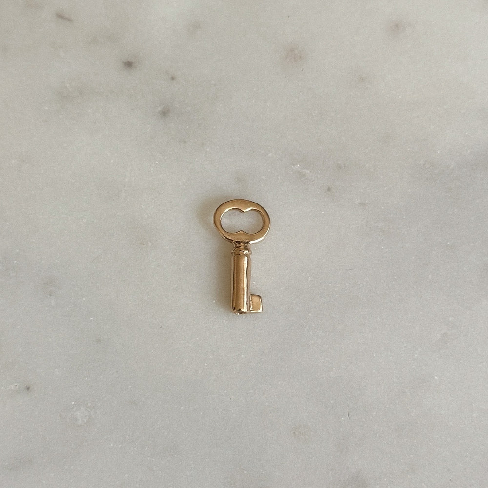 The MIMOSA Handcrafted Key Pendant in Bronze