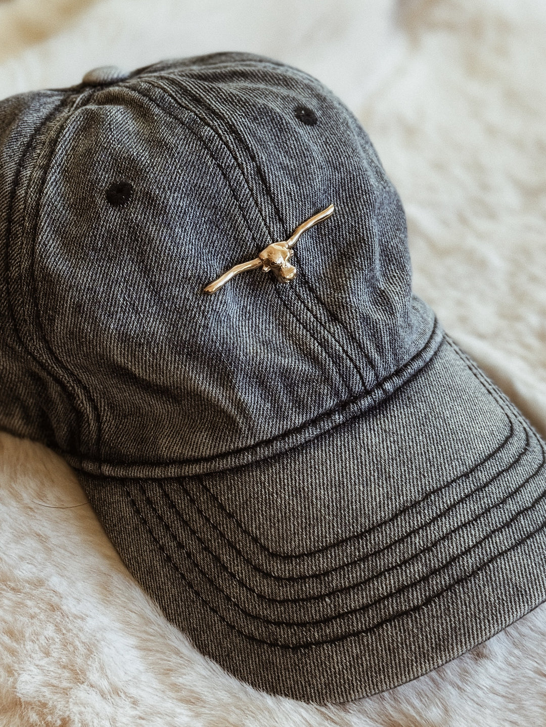 MIMOSA Handcrafted Longhorn Pin on a Baseball Cap