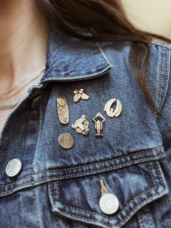MIMOSA Handcrafted Pins on a Denim Jacket