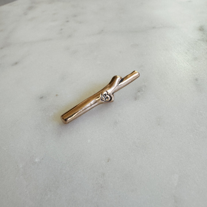 MIMOSA Handcrafted Red Stick Love Pin in Bronze