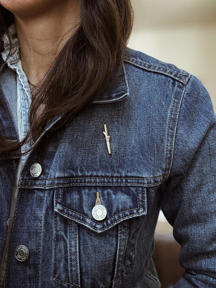 MIMOSA Handcrafted Red Stick Love Pin on a Denim Jacket