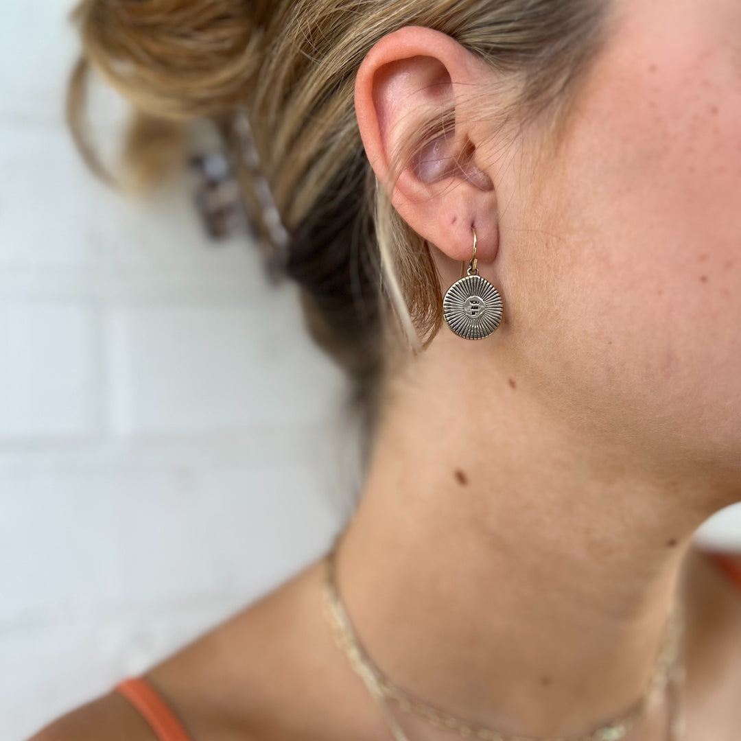 Woman Wears MIMOSA Handcrafted Small You Are My Sunshine Earrings in Bronze