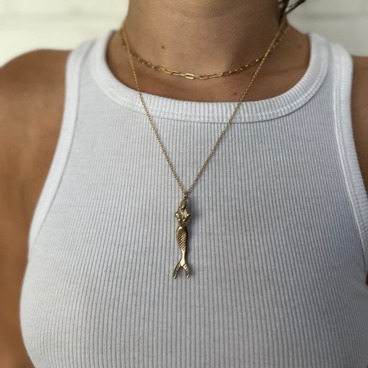 Woman Wearing Handcrafted Mermaid Pendant Necklace