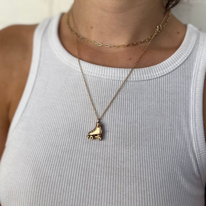 Woman Wearing Handmade Skate Pendant Necklace