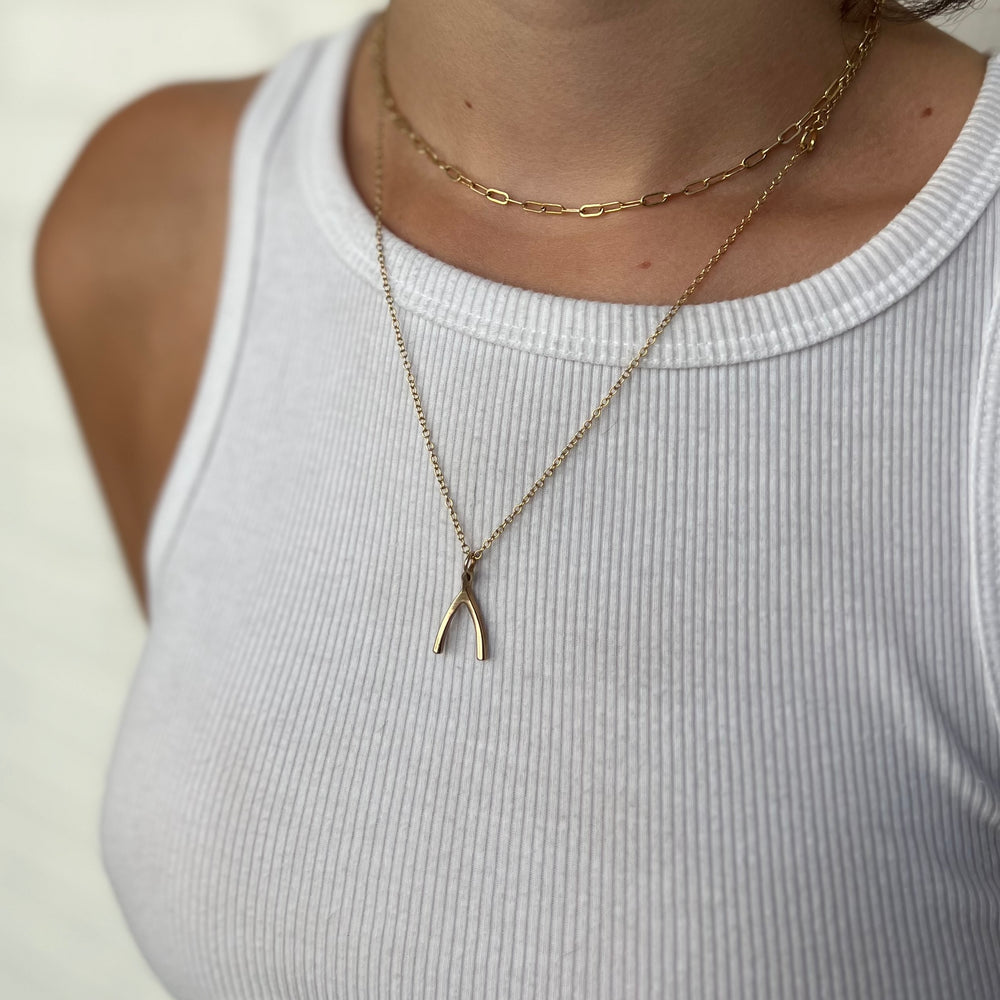 Woman Wearing Handcrafted Bronze Wishbone Pendant Necklace