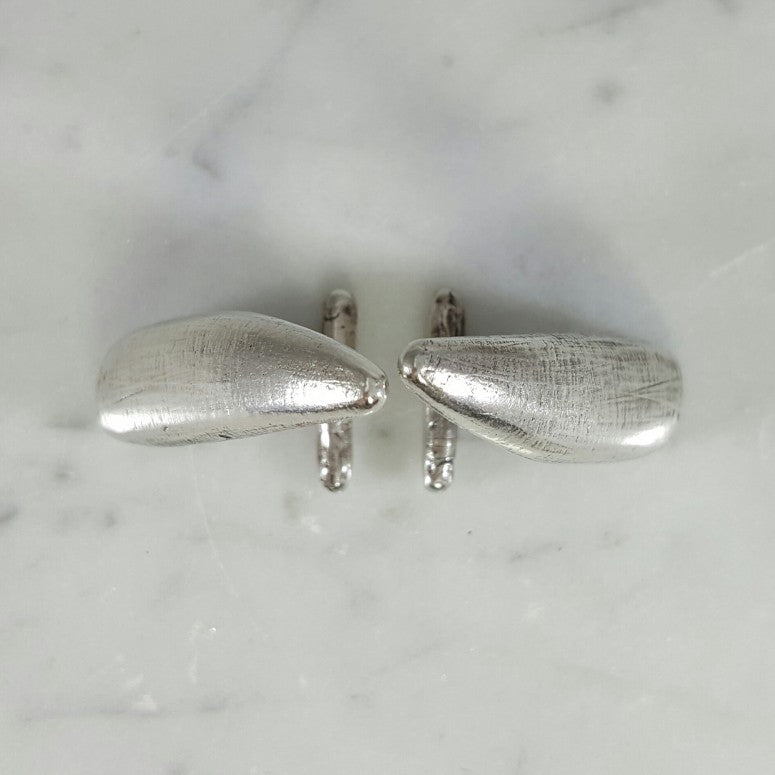 Top View of Handmade Sterling Silver Alligator Tooth Cufflinks