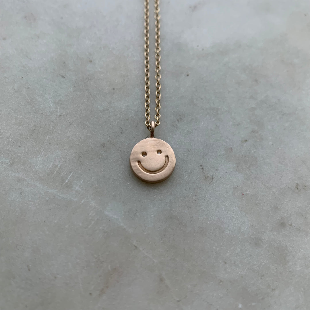 HAPPY FACE PENDANT