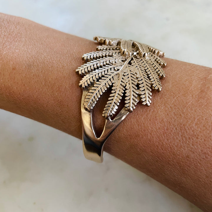 Woman Wearing Handmade Bronze Mimosa Leaf Cuff Bracelet
