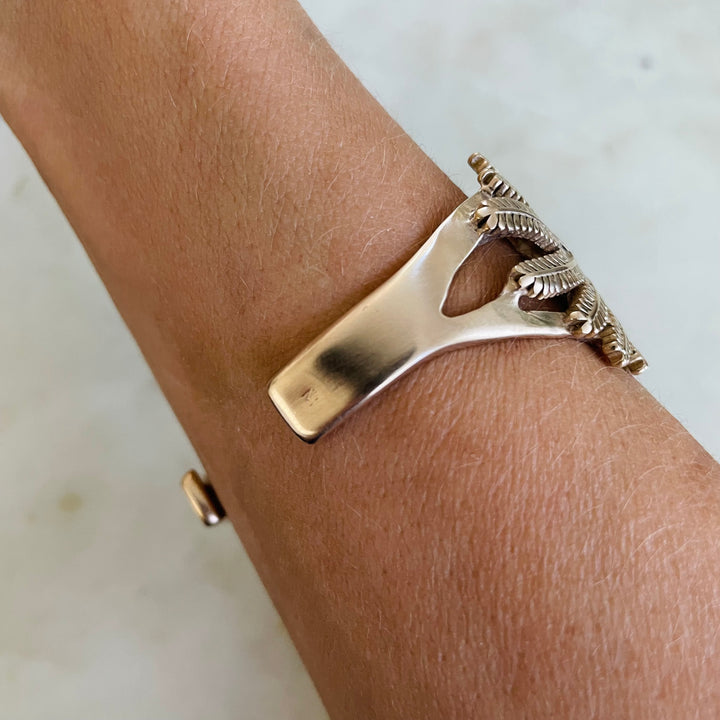 Woman Wearing Handmade Bronze Mimosa Leaf Cuff Bracelet