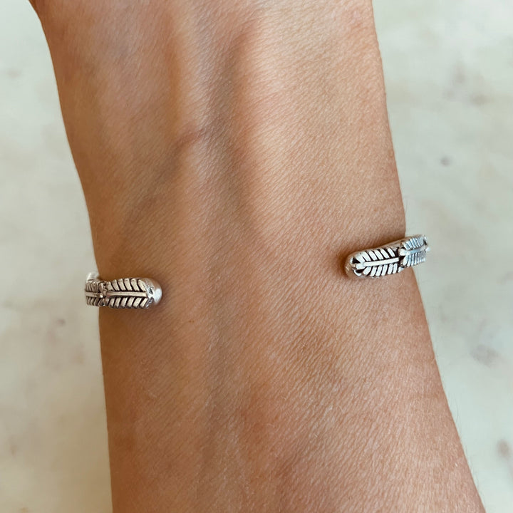 Woman Wearing Handmade Silver Mimosa Sprig Cuff Bracelet
