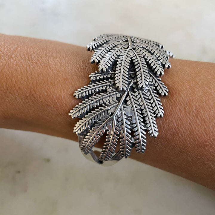Woman Wearing Handmade Silver Mimosa Leaf Cuff Bracelet