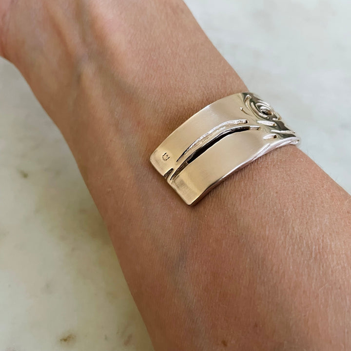 Woman Wearing Handmade Bronze Pecky Cypress Cuff Bracelet