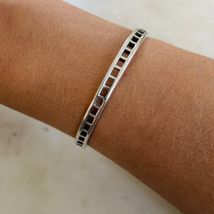Woman Wearing Handmade Silver Single Row Grid Cuff Bracelet