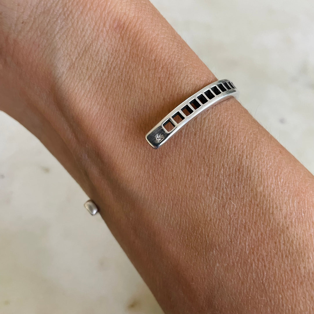 Woman Wearing Handmade Silver Single Row Grid Cuff Bracelet