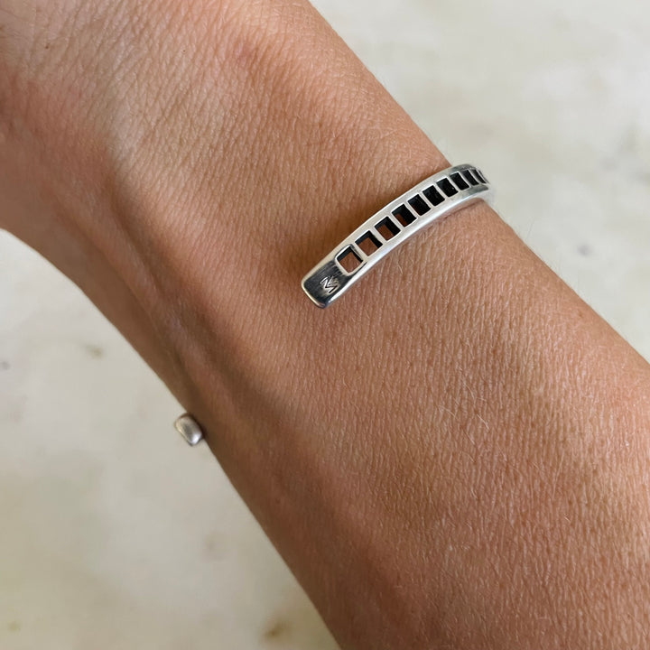 Woman Wearing Handmade Silver Single Row Grid Cuff Bracelet