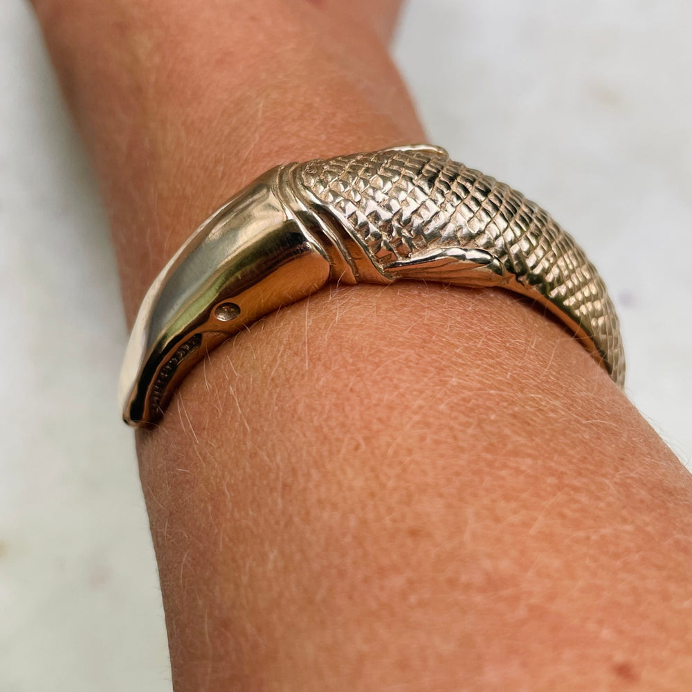 Person wearing the Alligator Gar Fish Bracelet | MIMOSA Handcrafted