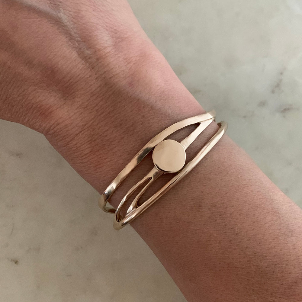 Woman Wearing Handmade Bronze Apricus Sun Cuff Bracelet