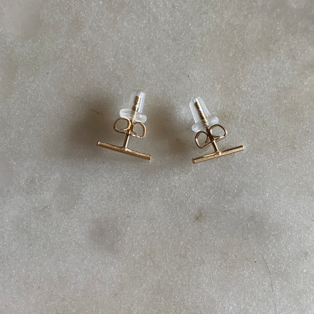 Gold-filled bar stud earrings with ear nuts and rubber backs