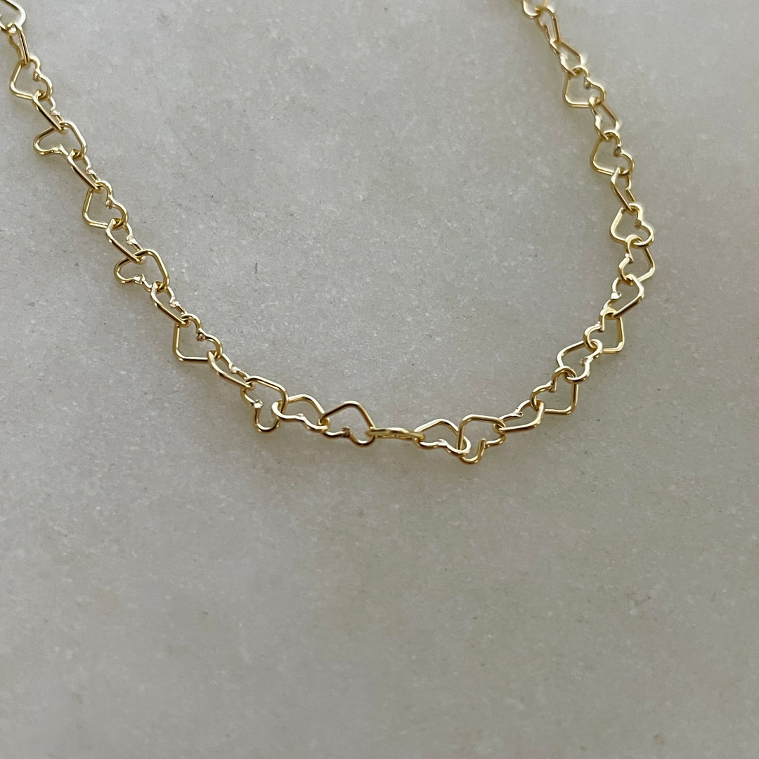 Dainty Gold-Filled Heart Chain Necklace Features Heart-Shaped Links.