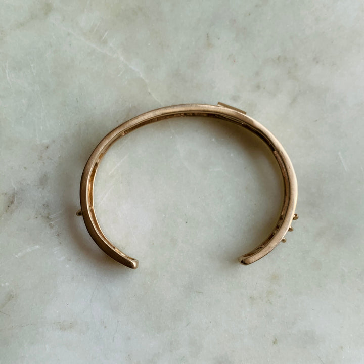 Side View of Handmade Bronze Daydreamer Cuff Bracelet with moving parts